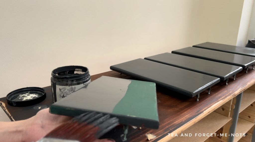 Painting furniture drawers with black paint