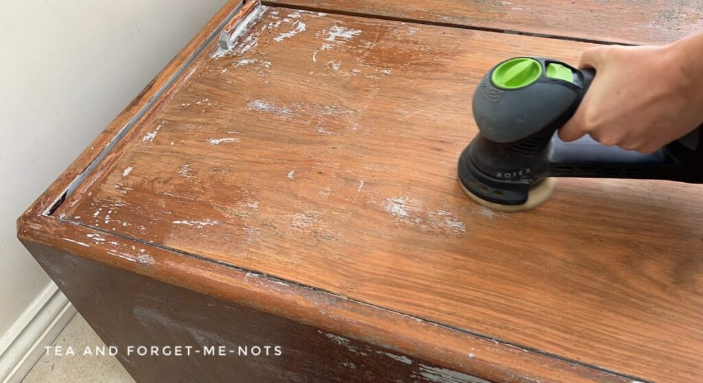 Removing paint with an electric sander