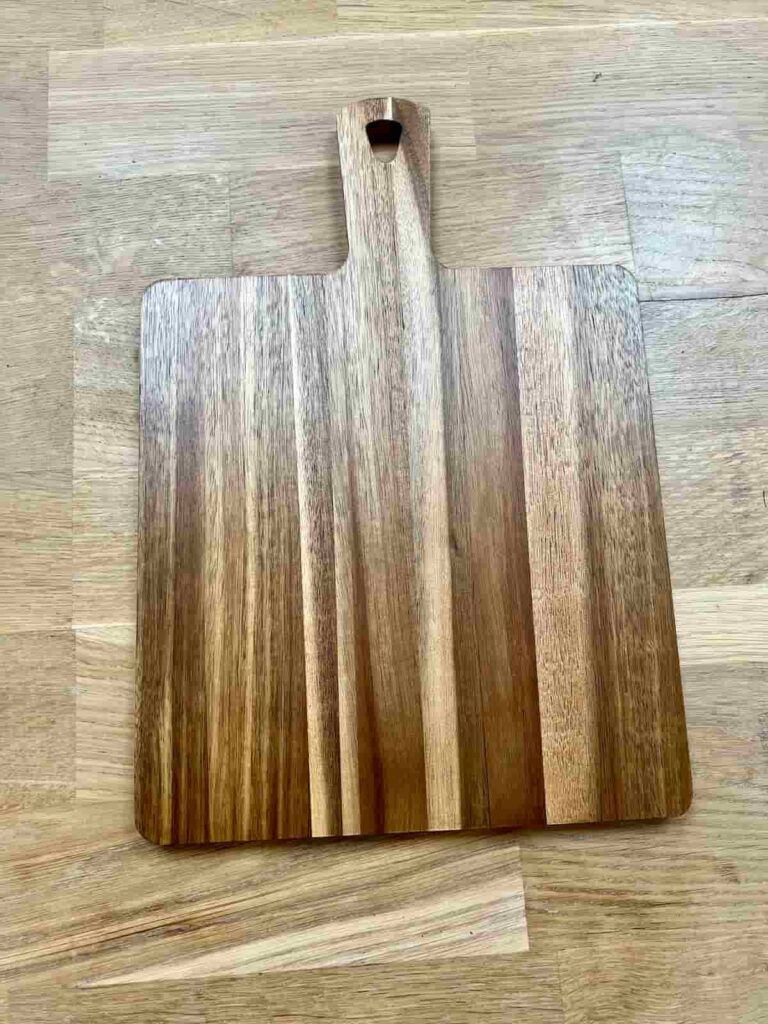 image shows acacia wood chopping board.