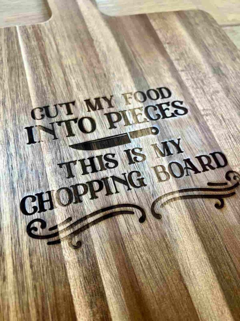 image shows chopping board after engraving with slightly charred edges.