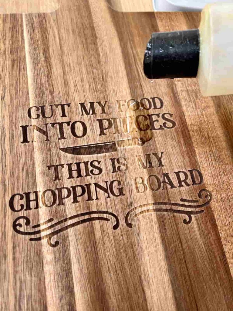 image shows sealing chopping board with hemp seed oil.