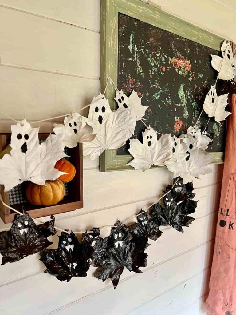 image shows a halloween ghost and bat garland.