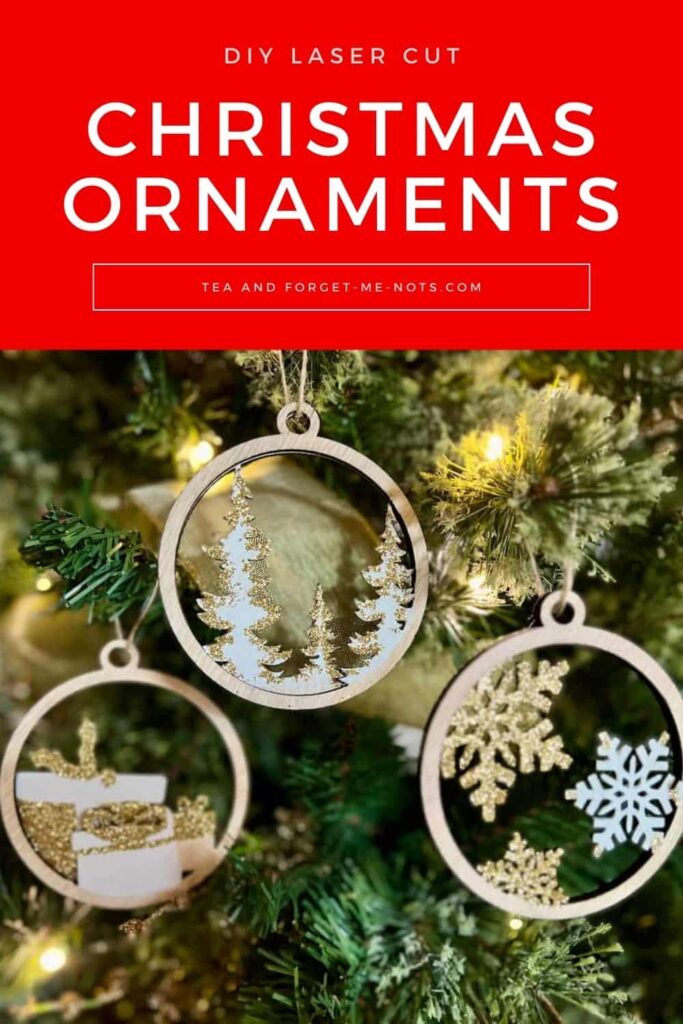 image shows laser cut ornaments on a tree.