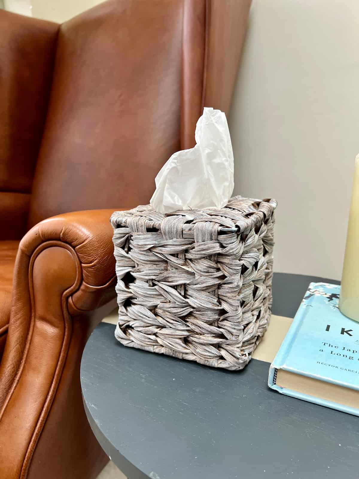 image shows upcycled tissue box on table.