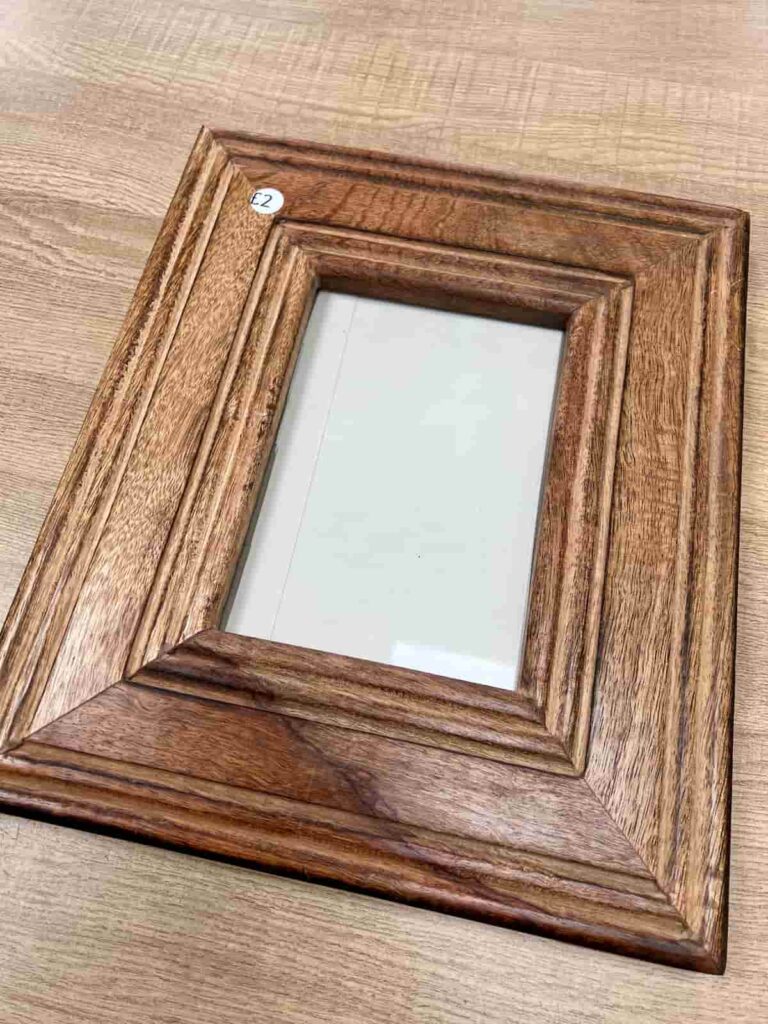 image shows a wooden photo frame.