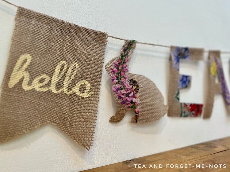 image shows a close up of burlap Easter garland.